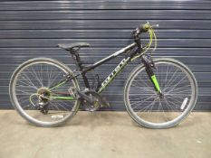 Carrera mountain bike in black and green