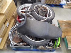 Pallet containing a quantity of assorted motorcycle parts to include engine components, lighting,