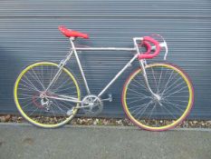 Vintage silver and red road bike