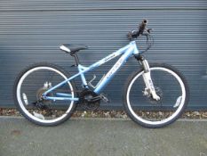 Blue and white child's Carrera bike