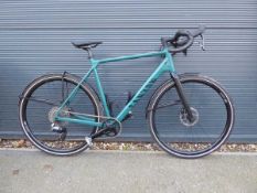 Green Canyon racing bike with battery and charger