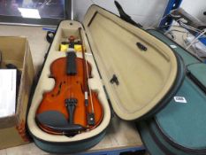 Violin and box in a case