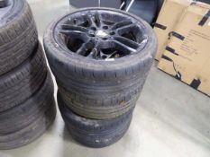 Four 18" BMW black alloy wheels with assorted tyres
