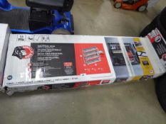 +VAT GorillaRack industrial four tiered storage rack with interlocking wire deck in box