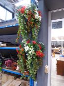 Two artificial planted hanging baskets
