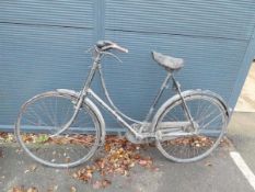 Black vintage town bike with a Lycetts seat