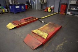 Floor mounted hydraulic vehicle lift with 3 phase electric console, cable, hose and cable protector