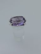 Silver ring set with natural amethyst stone rectangular and faceted