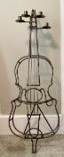 A Very Large Vintage Artisan Cast Iron Music Cello Shaped Candle Stand