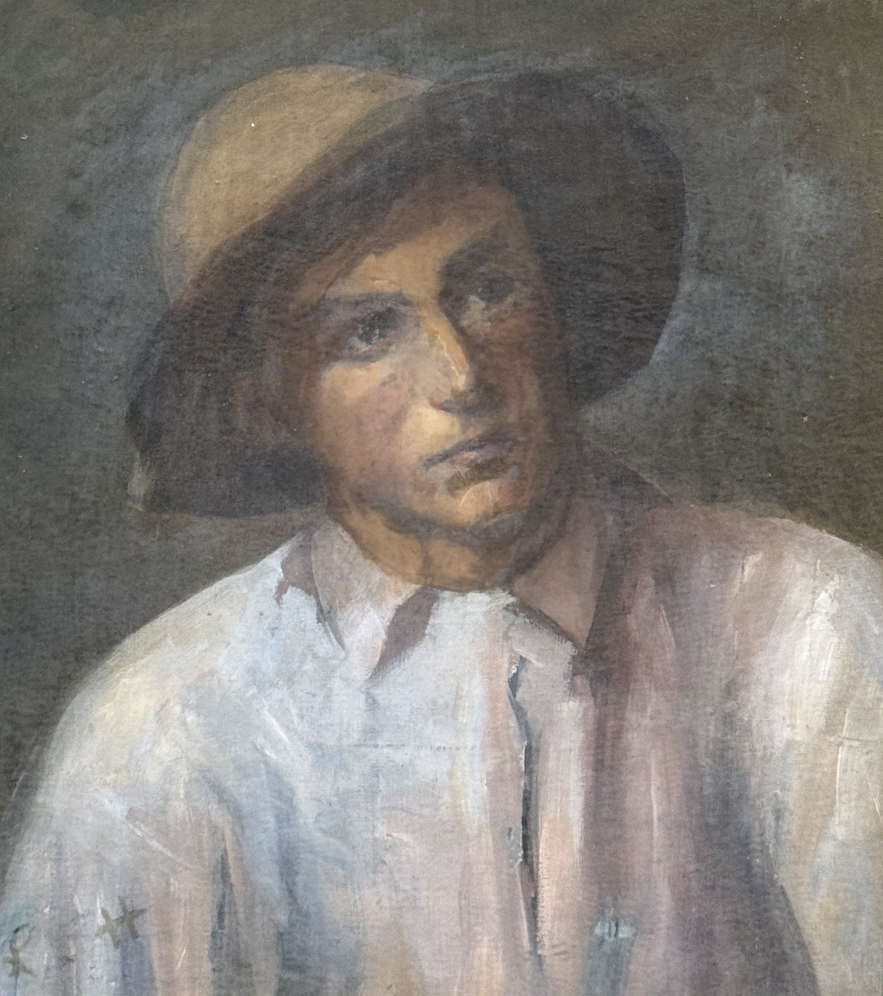 AN OIL PAINTING ON CANVAS DEPICTING A MAN WEARING A HAT Signed bottom ...