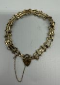 A 9ct gold gate bracelet, approximate weight 4.4g