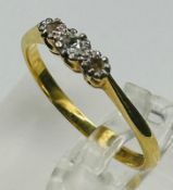 An 18ct gold and platinum diamond ring, approximate size 2.5g and size O