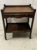 An oak serving trolly