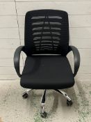 An office chair on chrome feet
