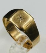 A 9ct gold signet ring with inset stone, approximate weight 3.2g and size U