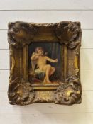 An ornately framed print