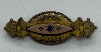 A 9ct gold brooch with steel pin, approximate total weight 3.7g