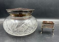 A large cut glass jar with silver mounted tortoiseshell lid with pique garland decoration,