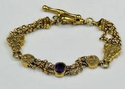 A 9ct gold bracelet with inset amethysts in the style of a watch chain, approximate total weight 18g