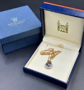 A Royal Mint Classics 9ct gold pendant on fine necklace, approximate total weight 5.8g and in