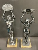 A pair of Art Deco sculptures signed Limousin on a square onyx base (H36cm)