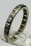 A diamond eternity ring, size N and weight 3.2g