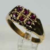 A 9ct yellow gold ring with rubies, approximate weight 3.7g and size N.5