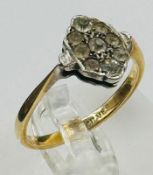 A 9ct gold and silver ring approximate size P.5 and weight 2.7g