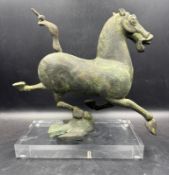 A limited edition cast iron sculpture of the flying horse of Kansu on plinth number 77 of 300