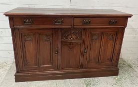 A mahogany two drawer sideboard (H95cm W155cm D50cm)