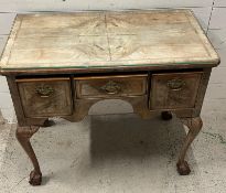 A Georgian side table/lowboy with ball claw feet (H74cm W88cm D49cm)