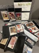 A collection of vintage postcards and First day covers including three bank notes