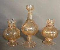 Three pearlized glass vases