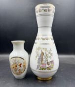 Two porcelain vases on white grounds (24cm and 13cm H)