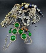 A selection of costume jewellery to include necklaces, bracelets, earrings etc.
