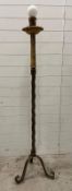 A candle effect floor standing lamp on twisted central column and on splayed legs. Height 166cm