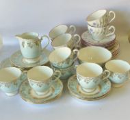 Two part china tea services, one by Royal Grafton
