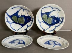 Two blue and white Chinese hand painted Koi Carp bowls and two side plates