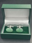 A boxed pair of Jade style Gents cuff links