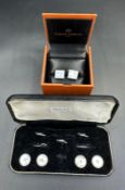 A pair of Gents cuff links by Simon Carter along with a pair of Sterling silver Gents shirt buttons
