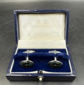 A pair of Mappin and Webb cuff links, boxed.