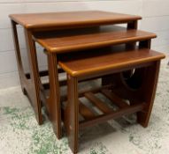 A nest of three Mid Century side tables