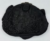 A black beaded evening bag