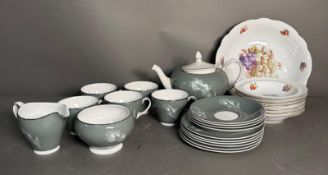 A part Simpsons tea service to include cups, saucers and a tea pot along with a grape themed fruit