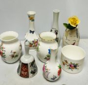 A selection of china bud vases