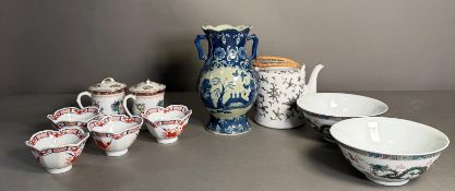 A selection of oriental ceramics to include Imari pattern lotus bowls, a two handles blue and