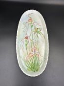 A porcelain bowl, hand painted with Western Australian wild flowers Spider Orchid and Dragon Orchid.