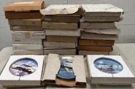 A quantity of boxed picture plates, various makers and subjects