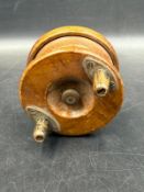 A decorative fishing reel