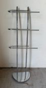 A contemporary chrome three rail towel rack (H105cm)